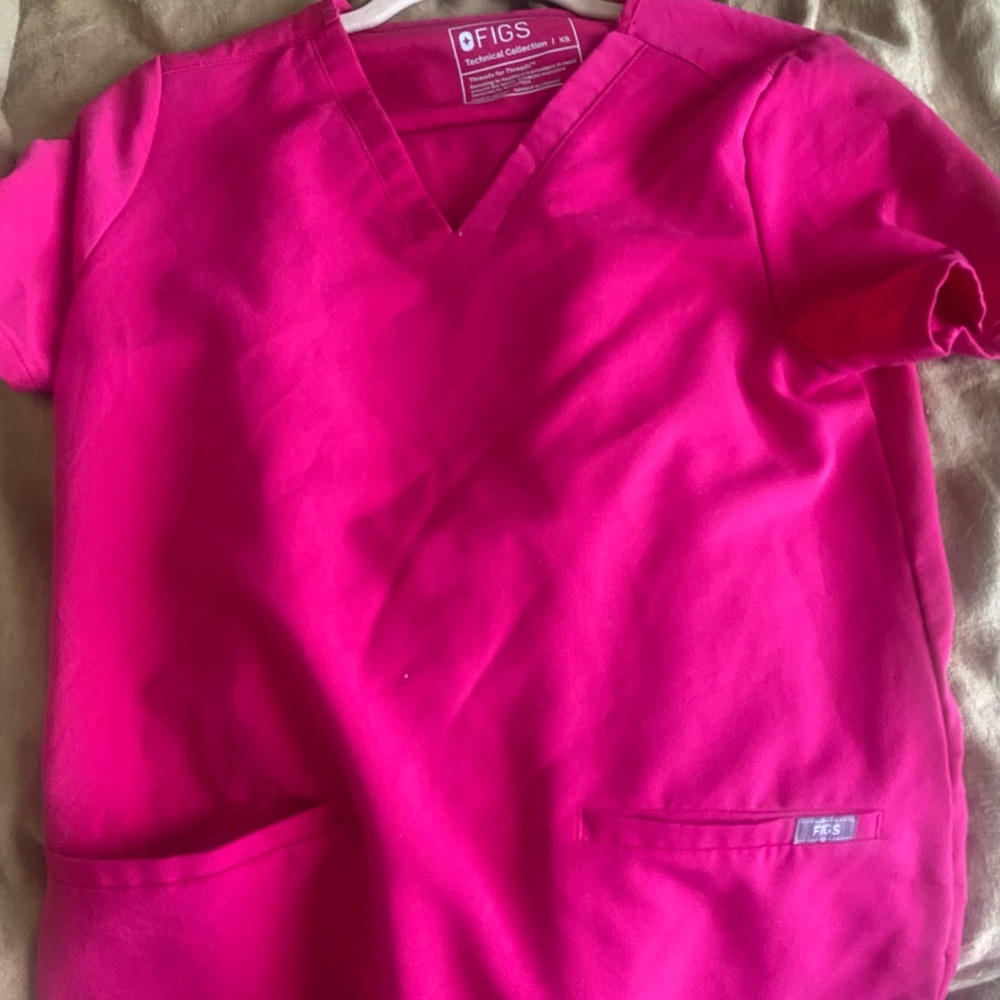 Figs scrubs in hot pink. Basically brand new, only worn once.